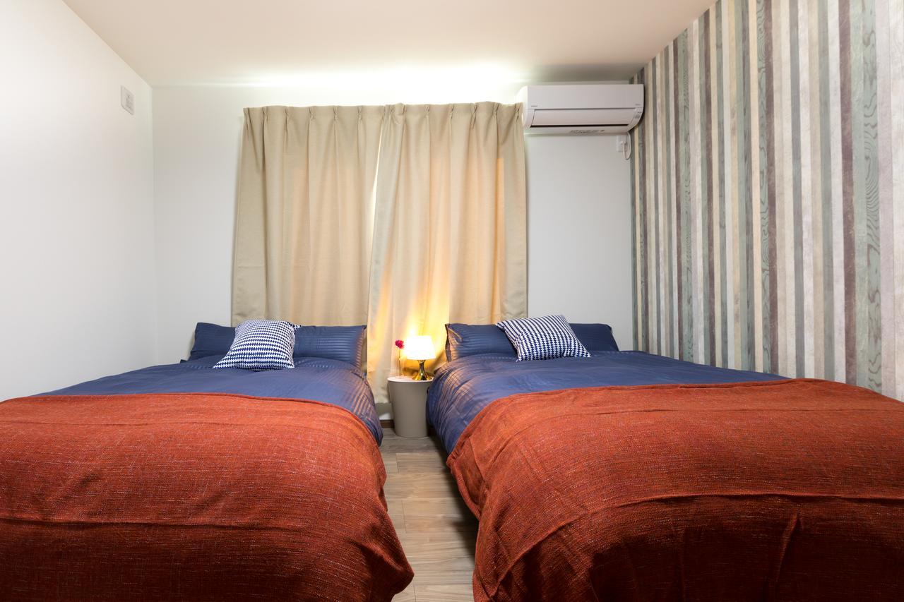 Corlux Villa Osaka Bagian luar foto
